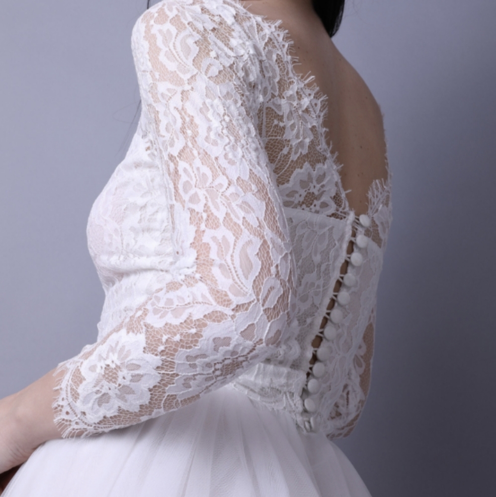 Sheer ivory boat neck bridal top